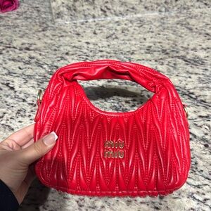 Designer inspired red bag